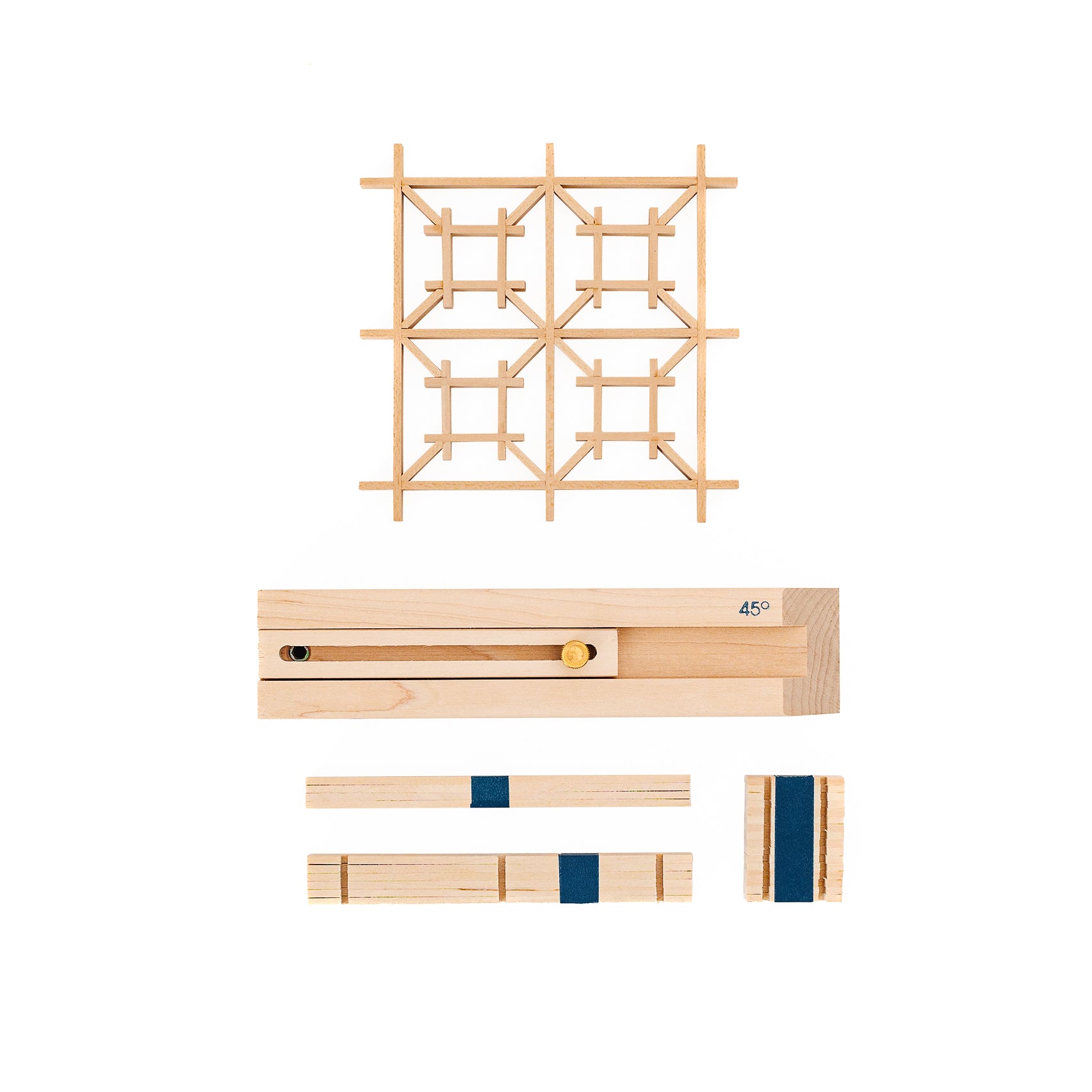 A flatlay display of Izutsu Kit supplies and tools, as well as a completed Izutsu kumiko panel.