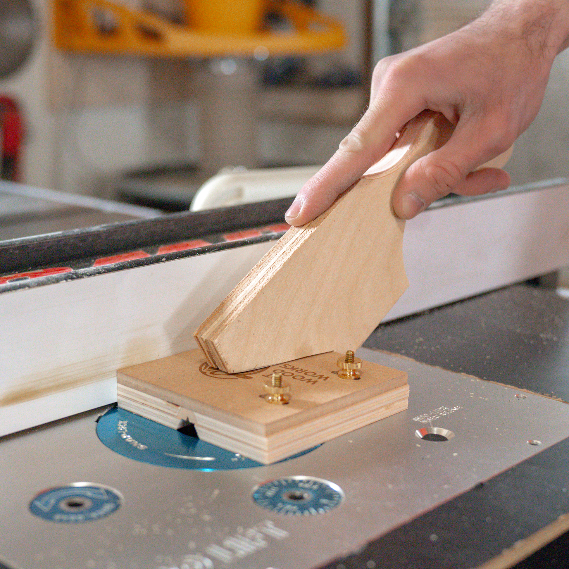 A Sakura Shuttle in use on a router table.