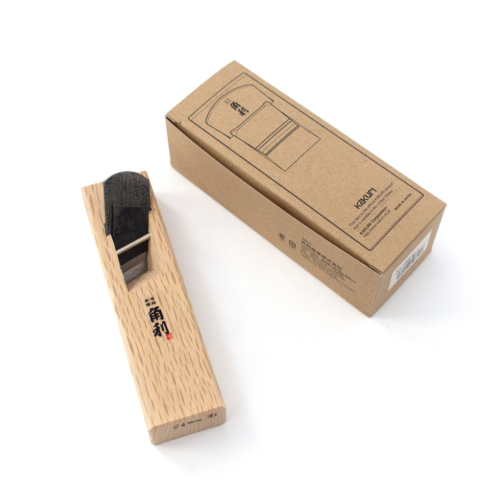 Photo of the Kiwa Kanna 24 mm hand plane and its boxed packaging next to it.