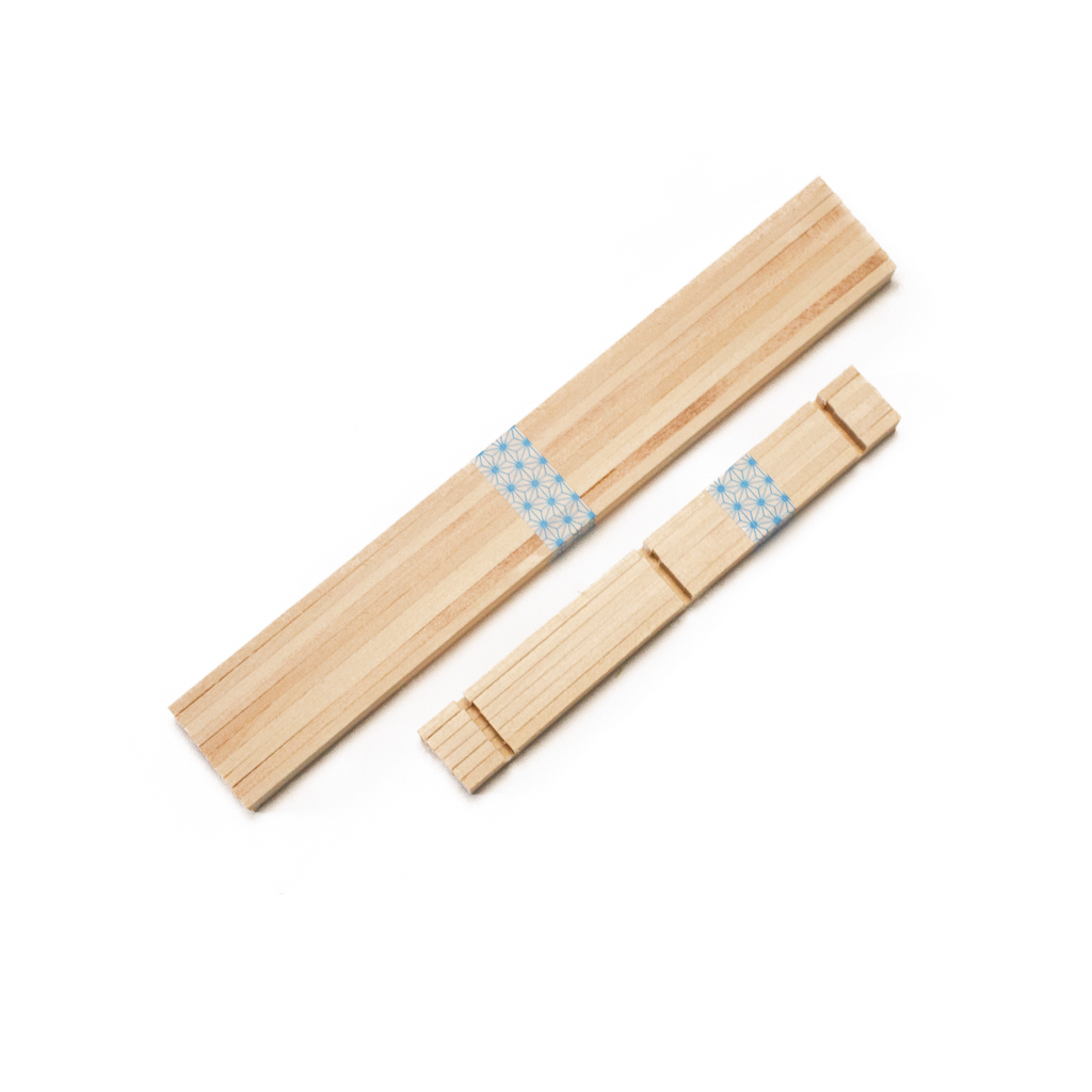 Basswood strip for the kit, wrapped in washi tape.