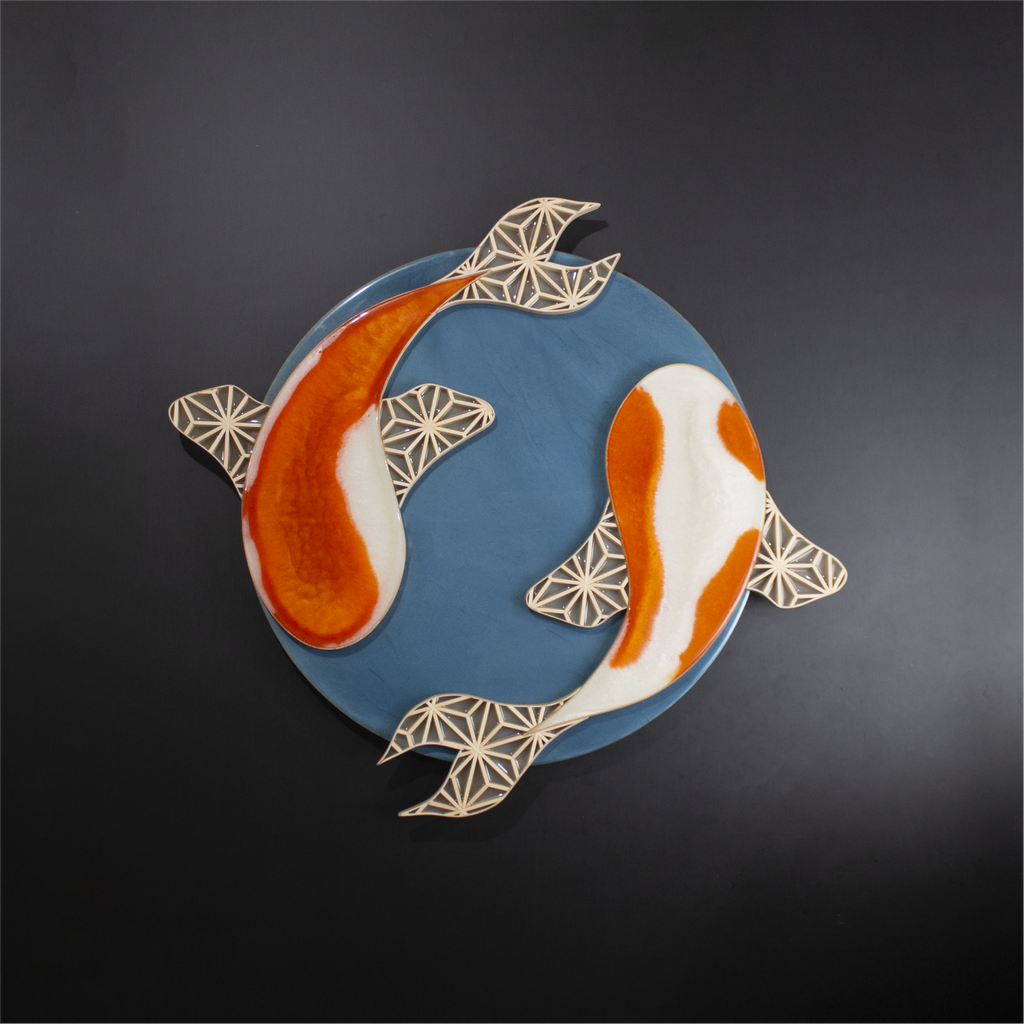 Combining traditional kumiko woodworking with vibrant epoxy, the Kumi-Koi (a handcrafted decorative piece) showcases two koi fish gracefully intertwined in a Yin-Yang flow.